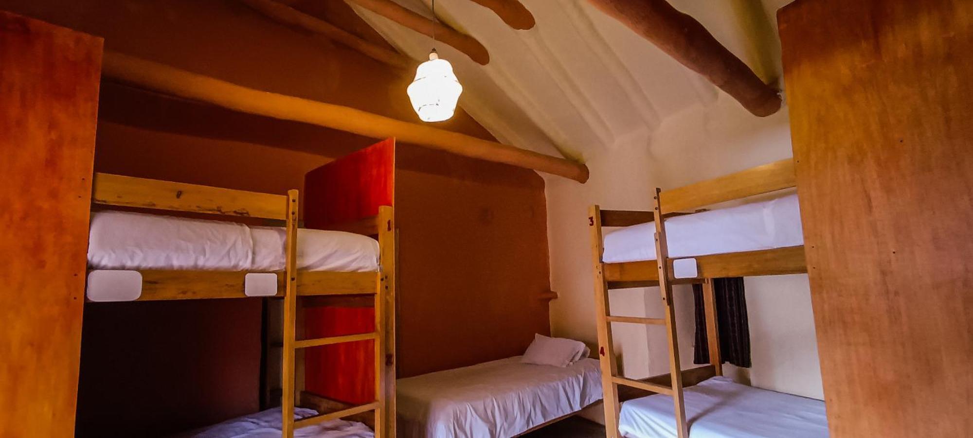 Quarto Quádruplo com Banheiro Compartilhado